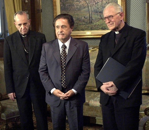 S bývalým argentínskym prezidentom Eduardom Duhaldem v roku 2002.