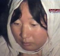 Video odvysielané stanicou al-Džazíra zachytáva jednu z unesených Kórejčaniek zadržiavaných Talibanom.