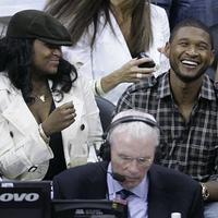Usher a jeho novomanželka Tameka Fosterová