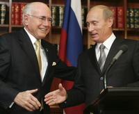 Ruský prezident Vladimír Putin a austrálsky premiér John Howard