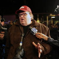 Režisér Michael Moore.