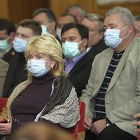 Na Ukrajine sa proti chrípke chránia rúškami