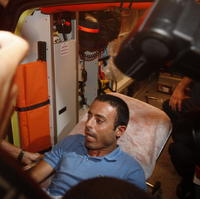 Palestínčan Nadim Injaz po zatknutí políciou.
