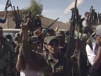 Povstalci sa tešia z Kaddáfiho smrti
