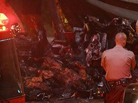 Desivý záber, ktorý má zachytávať zhorené telo Paula Walkera a Rogera Rodasa krátko po smrti vo vraku auta.