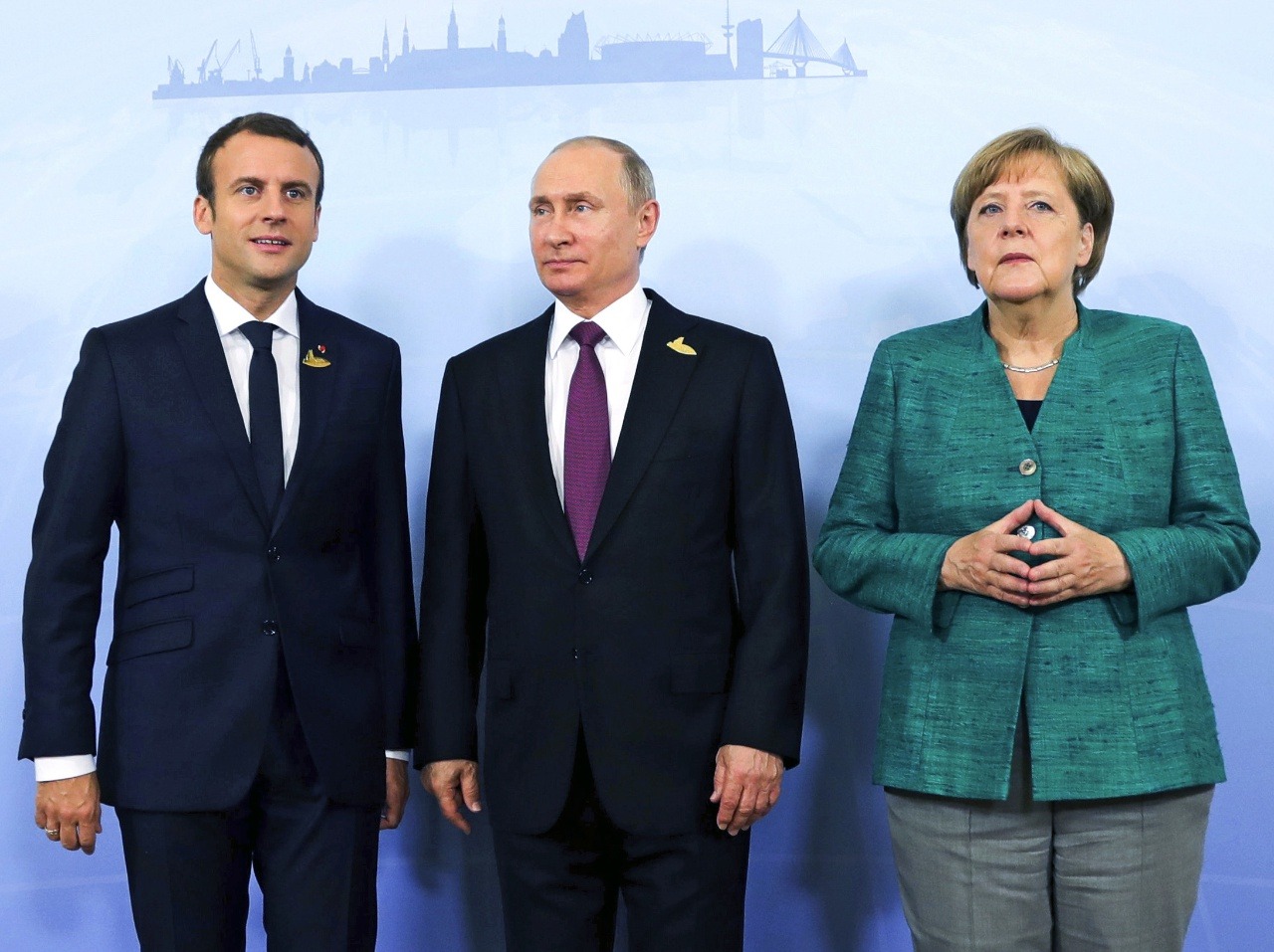 Angela Merkelová, Emmanuel Macron a Vladimir Putin