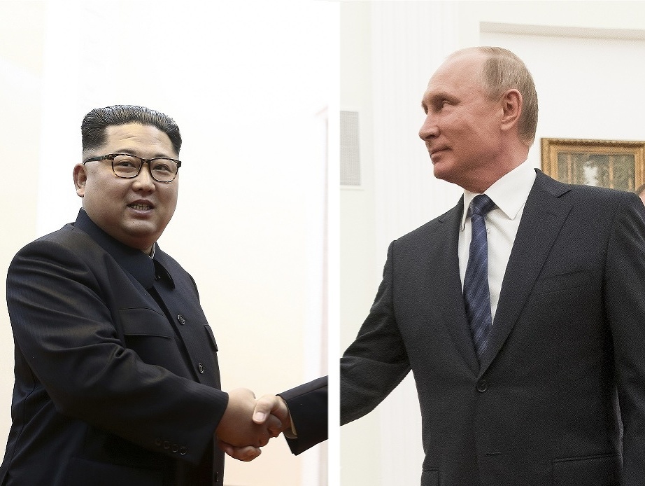 Vladimir Putin a Kim Čong-un.