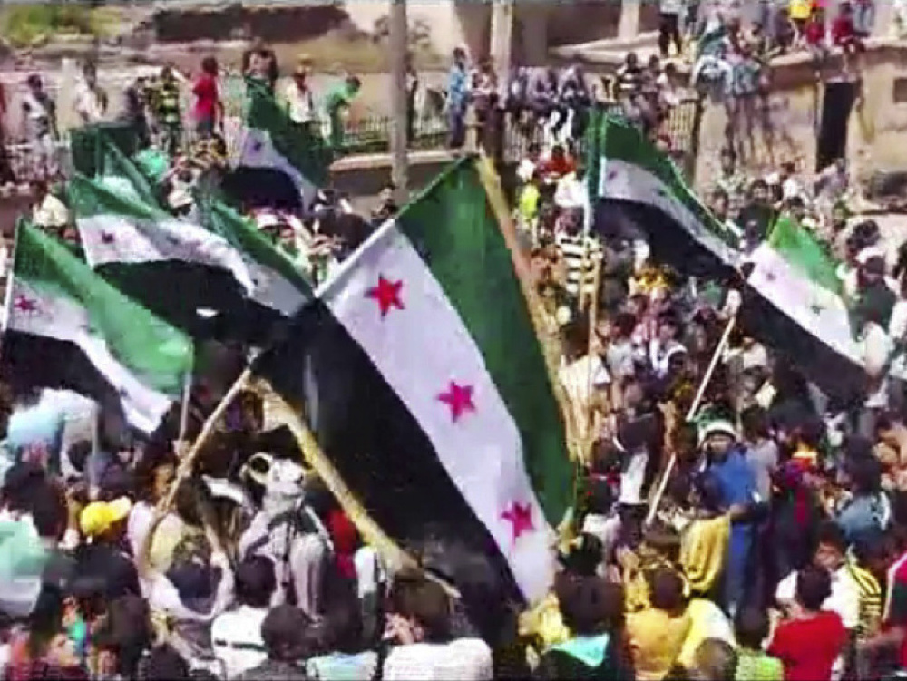 Sýrska armáda vztýčila vlajku nad mestom Dará. 