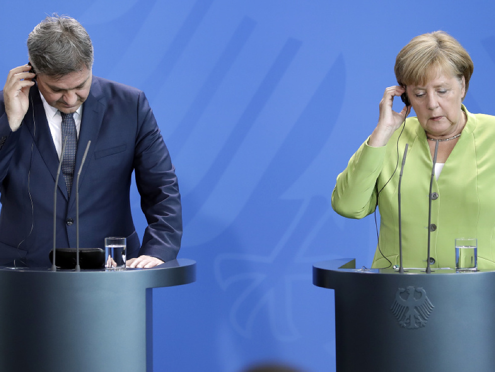 Denis Zvizdič a Angela Merkelová