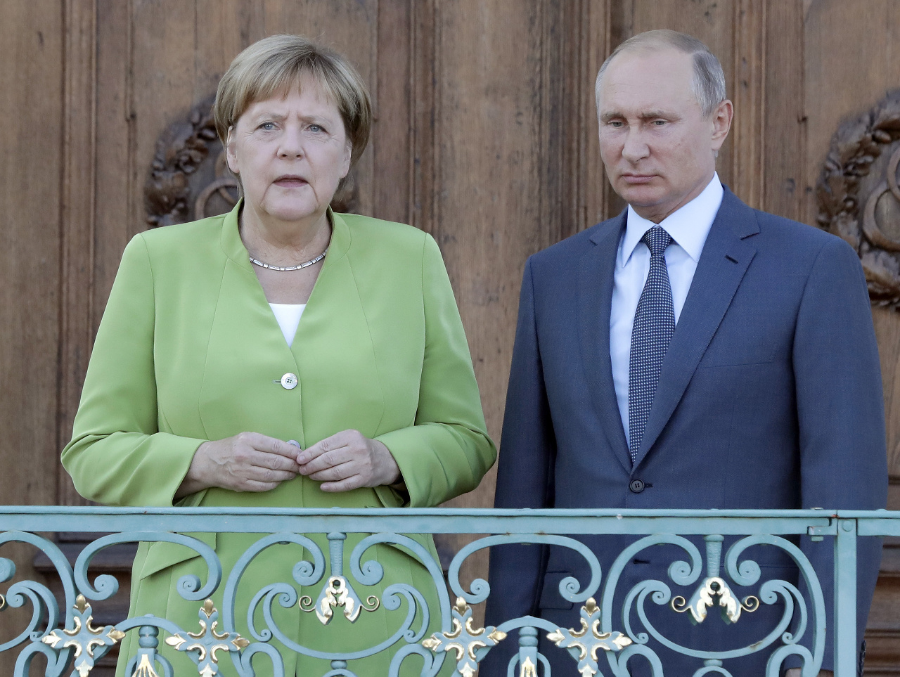 Nemecká kancelárka Angela Merkelová počas spoločnej tlačovej konferencie s ruským prezidentom Vladimirom Putinom