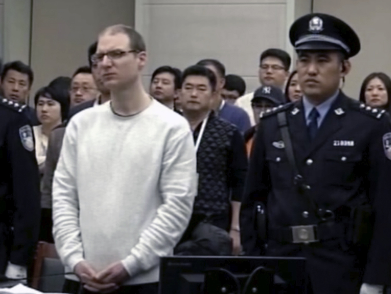 Kanaďan uväznený v Číne: Chcú ho popraviť, súd odložil pojednávanie na neurčito