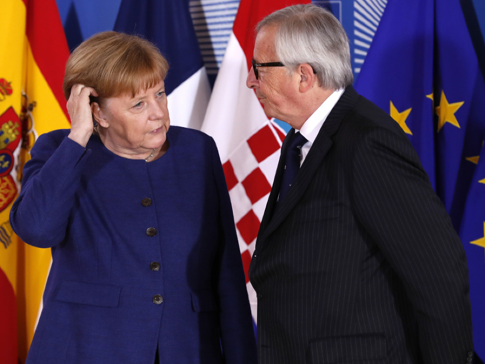 Nemecká kancelárka Angela Merkelová a predseda Európskej komisie Jean-Claude Juncker. 