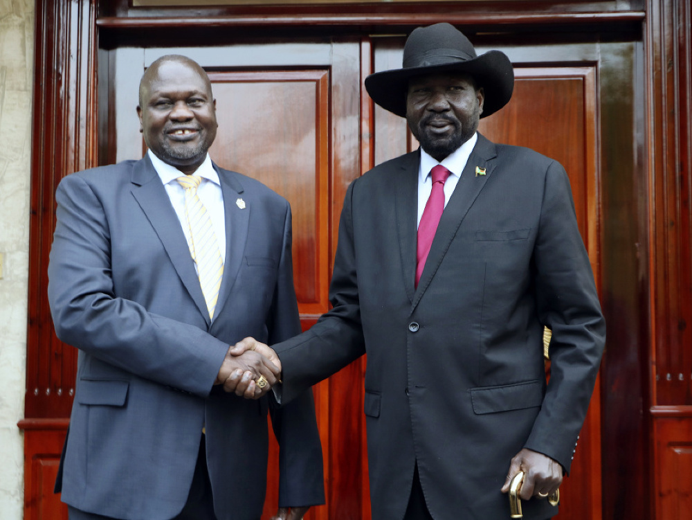 Vodca povstalcov Riek Machar a prezident Salva Kirr