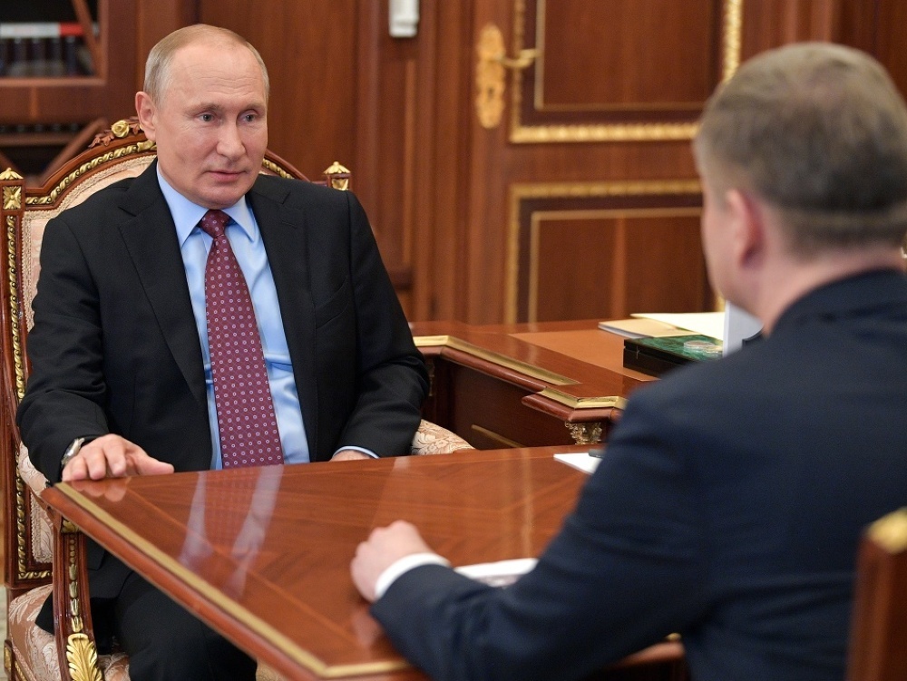 Vladimir Putin (vľavo) a Oleg Belozyorov (vpravo)