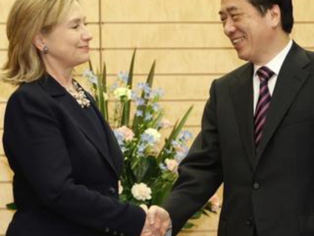 Hillary Clintonová a japonský premiér Naoto Kan