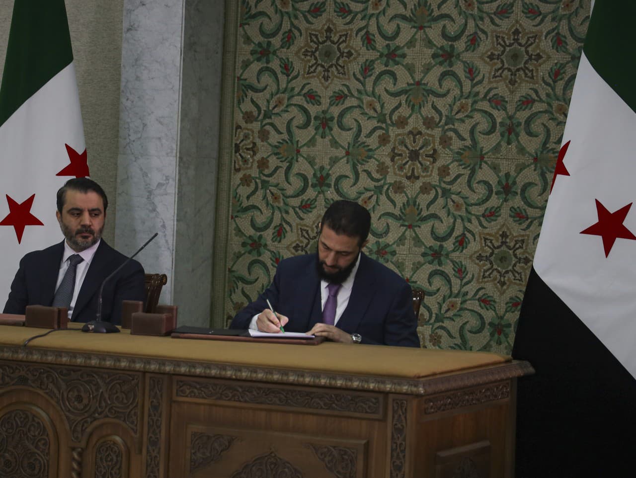 Sýrsky dočasný prezident Ahmad Šara