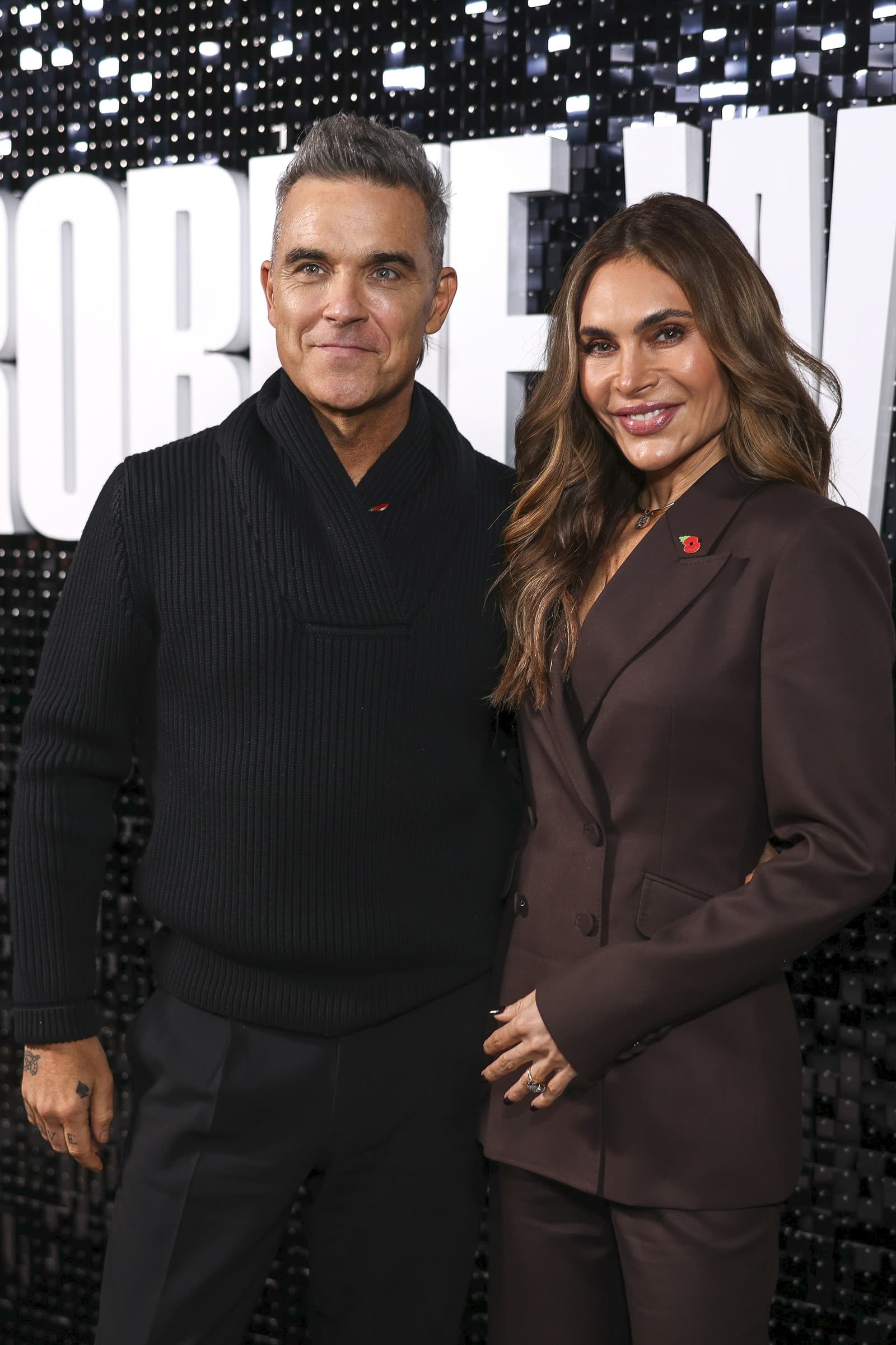 Robbie Williams s manželkou. 