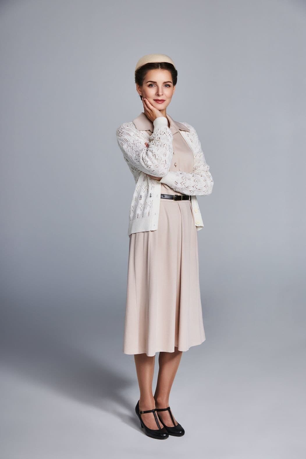 V televízii šedá myška,