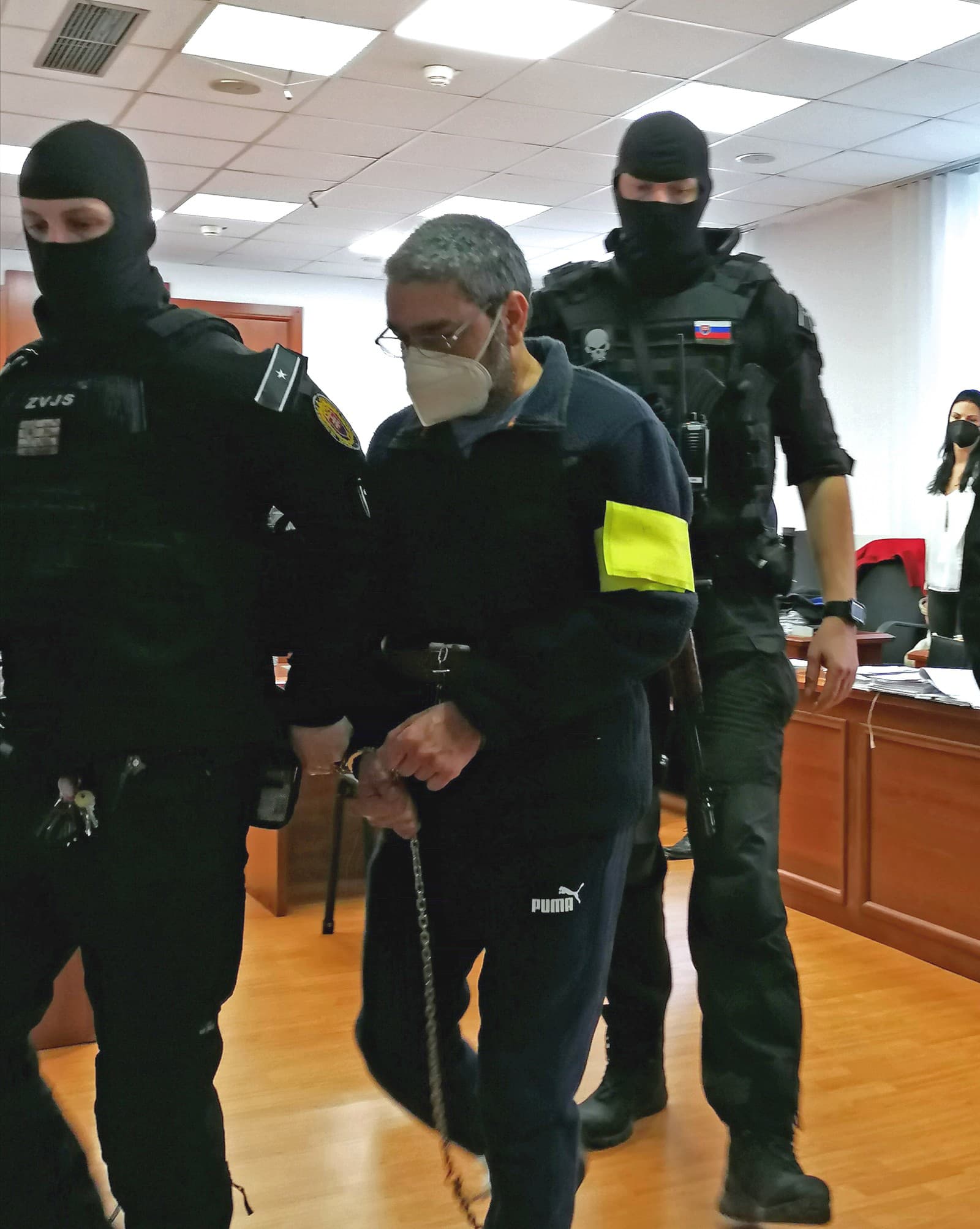 Archívna snímka, na ktorej je Darya Khan Safi na Špecializovanom trestnom súde (ŠTS) v Pezinku v marci 2022
