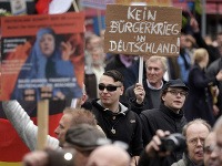 Protest proti migračnej politike Angely Merkelovej