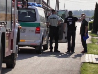 Polícia pred domom zavraždeného novinára. Polícia pred domom zavraždeného novinára.