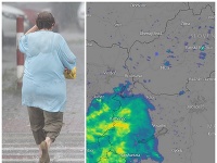 Na snímke žena prechádza cez ulicu počas búrky a silného dažďa v Podunajských Biskupiciach v Bratislave. Na snímke žena prechádza cez ulicu počas búrky a silného dažďa v Podunajských Biskupiciach v Bratislave.