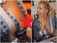 Dare Rolins počas autogramiády vykukol prsník. Dare Rolins počas autogramiády vykukol prsník.