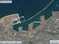 Prístav s časťou centra mesta po výbuchu.