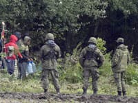 Poľskí vojaci na hranici s Bieloruskom Poľskí vojaci na hranici s Bieloruskom