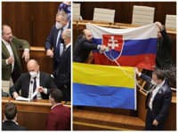 V parlamente je hotový cirkus, pred rečníckym pultom sa spustila vodno-vlajková vojna.