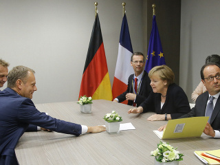 Donald Tusk (vľavo), Angela