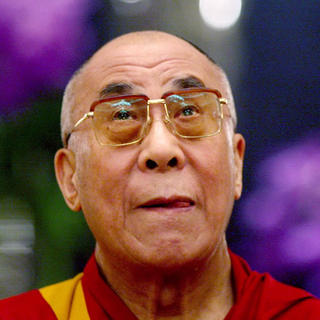 Aktivisti chcú s dalajlámom