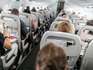FOTO Pasažieri v lietadle
