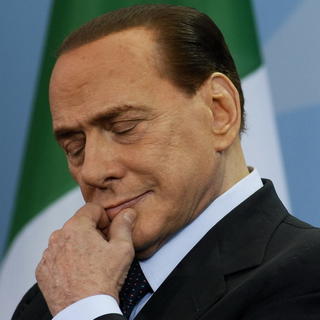 Parlament podporil Berlusconiho v