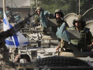 Izraelskí vojaci na hranici