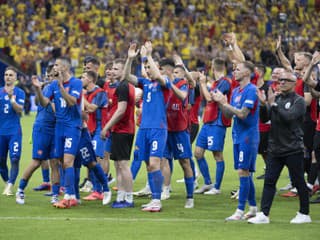 Na snímke vpravo tréner