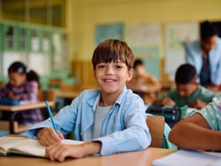 Happy elementary school student