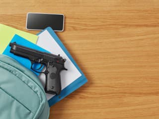 Gun, bag, mobile phone