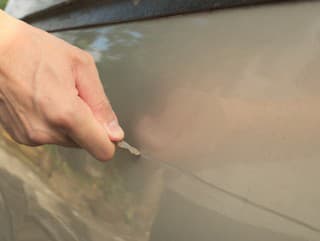 Male hand scratching a