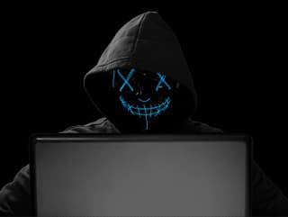 hacker with glowing mask