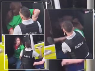 Policajt udrel spútanú ženu