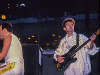 Freddie Mercury, John Deacon