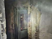 V neobývanej budove našli hasiči po požiari telo