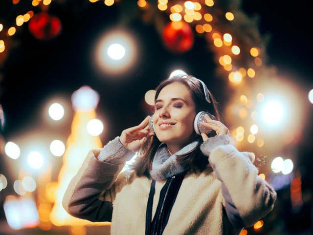 Lady enjoying xmas playlist