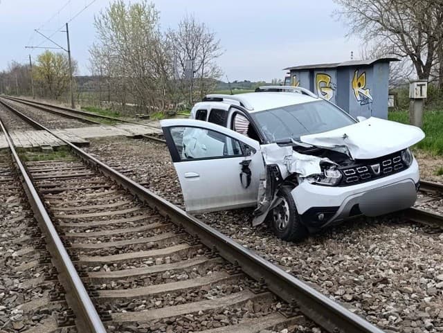 Zrážka auta s vlakom