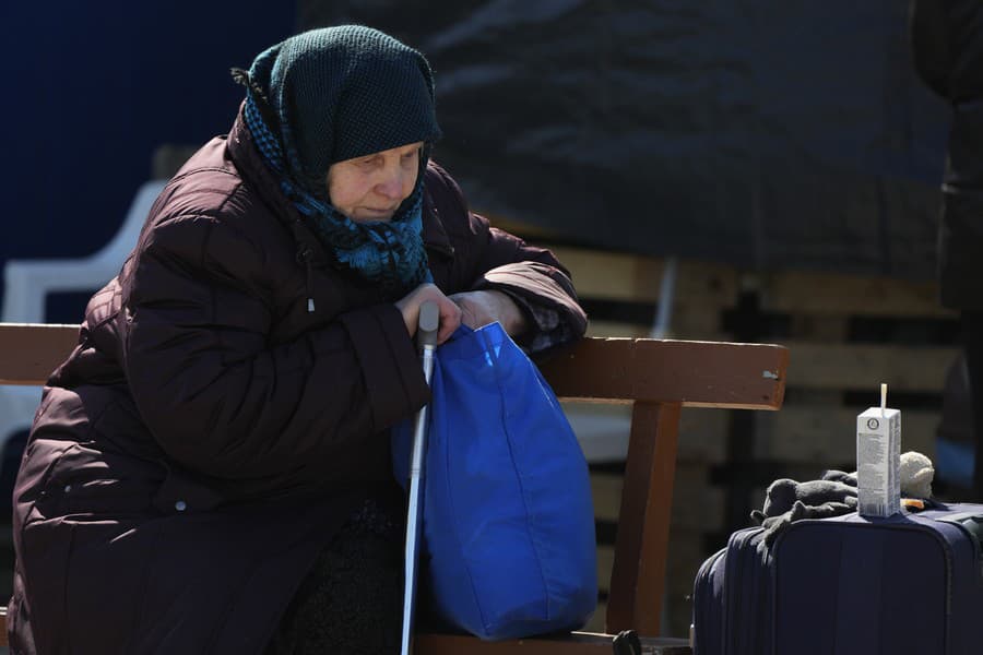 Ukrajinskí utečenci na moldavskej hranici.