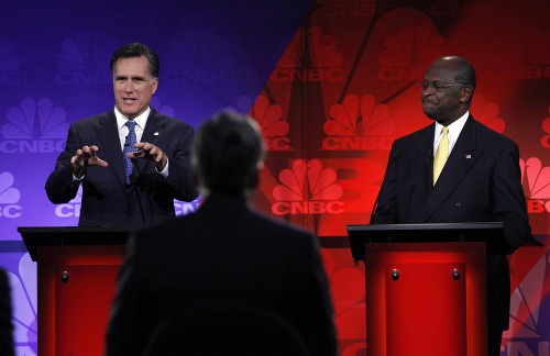Mitt Romney a Herman Cain počas debaty