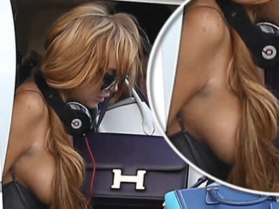 Herečke Lindsay Lohan pri vystuponí z helikoptéry 