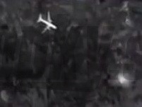 Družicové snímky stíhačky MiG-29 pohybujúcej sa v blízkosti lietadla malajzijských aerolínií, ktoré sa zrútilo na Ukrajine.