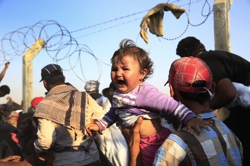 Utečenci zo Sýrie na hraniciach Talianska.